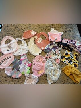 Lot of newborn to size 6 months hats socks and bibs - 27 items! Girls